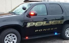 The drivers side of a Ponder Texas police car